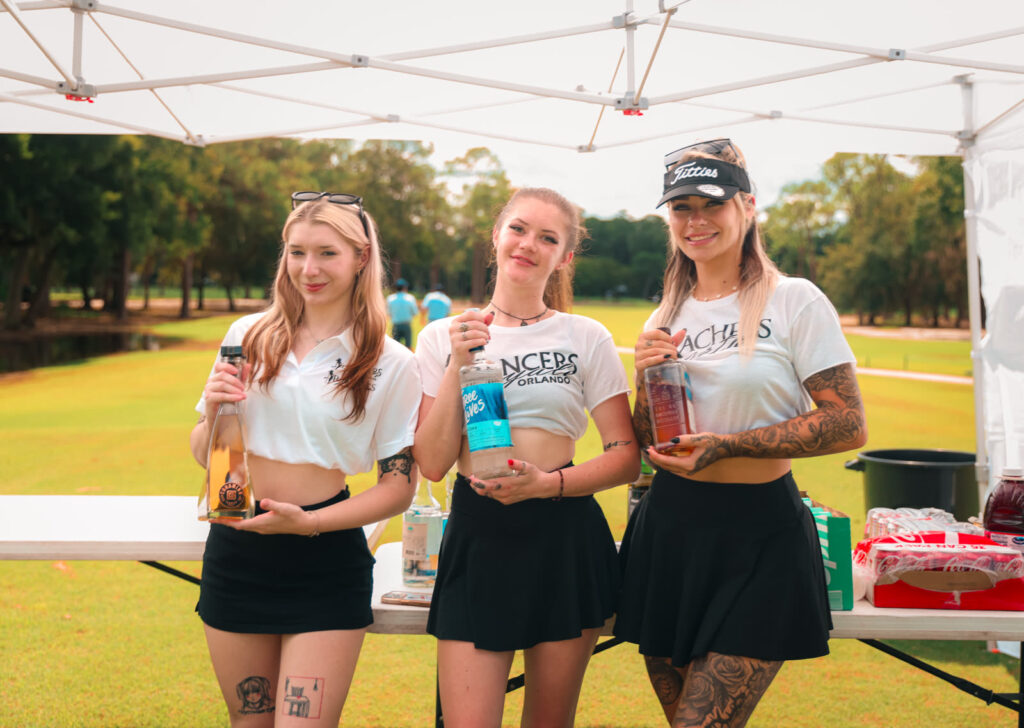 The beverage crew serving drinks on course at the Dancers Royale charity golf tournament
