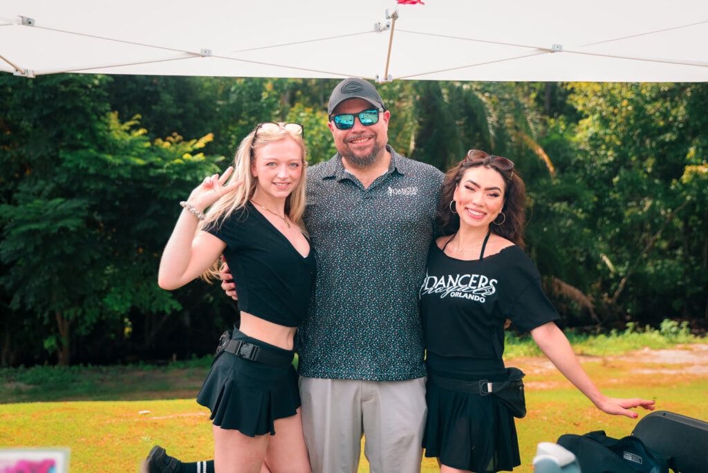 Guests and Dancers Royale entertainers at the 2026 Troops & Tails charity golf tournament